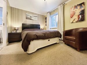 Bedroom One- click for photo gallery